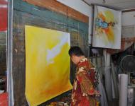 12半個鐘都沒有一幅已經掛在墻上，另一幅底色也鋪好……畫風也如他人一樣奔放！