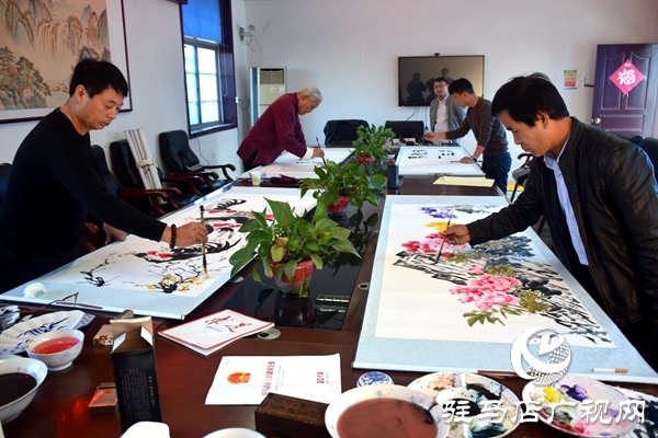 老君廟鎮科技文化服務中心開展文化進基層書畫活動